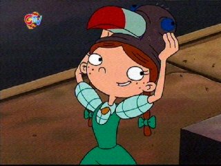 (The sweet... but annoying) Lila (Ashley Buccille) holding a toucan hat over her head: this is just before Arnold swears her off for good